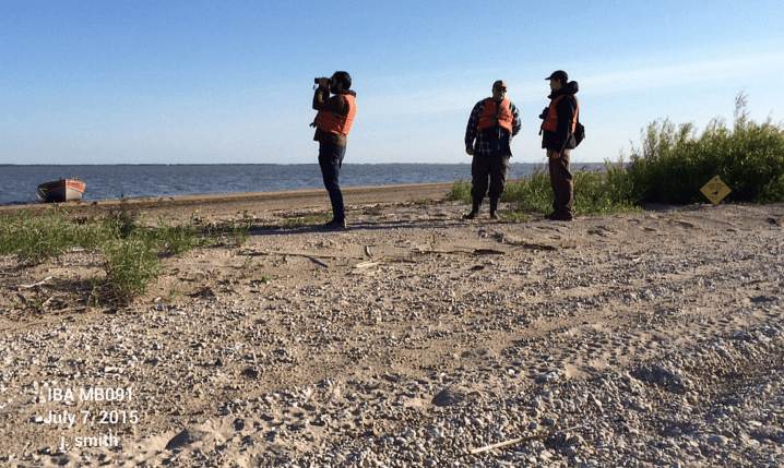 Myself, Dave, and Tim havin' a look around the sand bar. Photo by Joanne Smith.